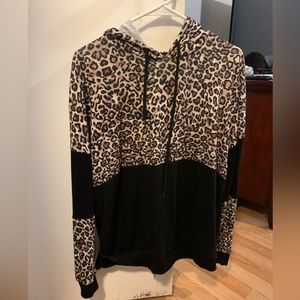 Long sleeve Shirt with a hood. It’s very cozy i’ve only worn a few times.